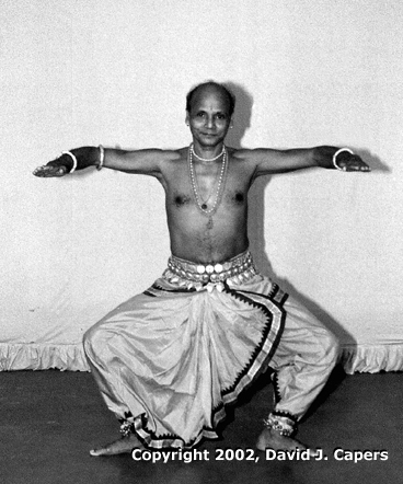 Guru Kelucharan Mohapatra in the classic chauka pose of Orissi Dance